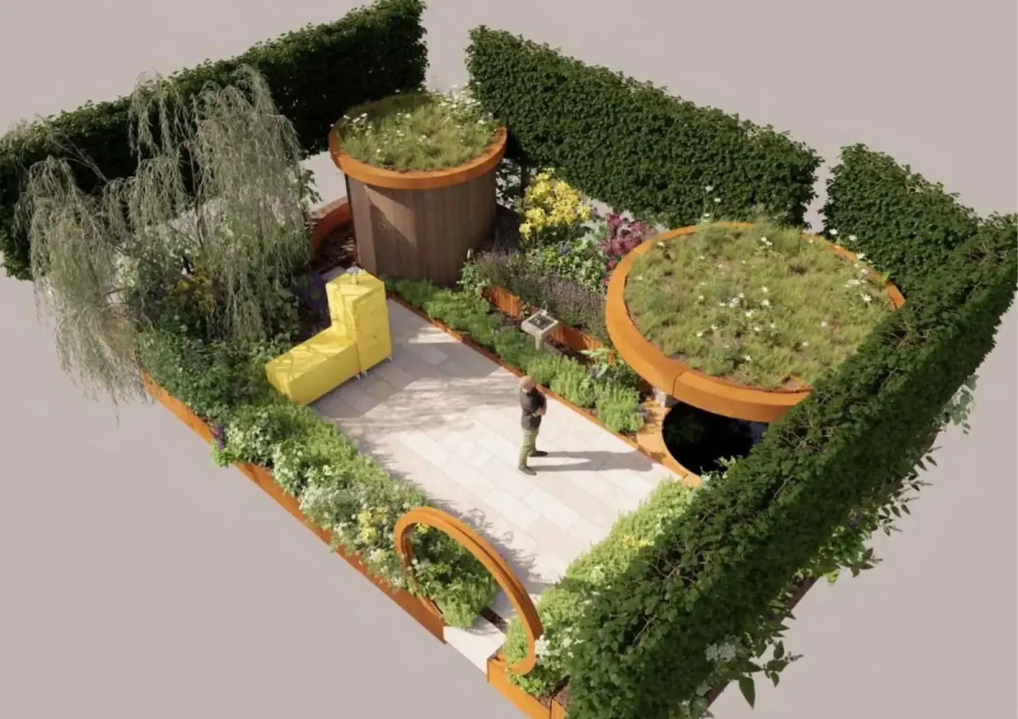 A contemporary garden features circular corten steel planters with green roofs, a weeping tree, a bright yellow L-shaped bench, and diverse planting around a light paved path.